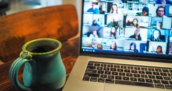 Laptop displaying group of people